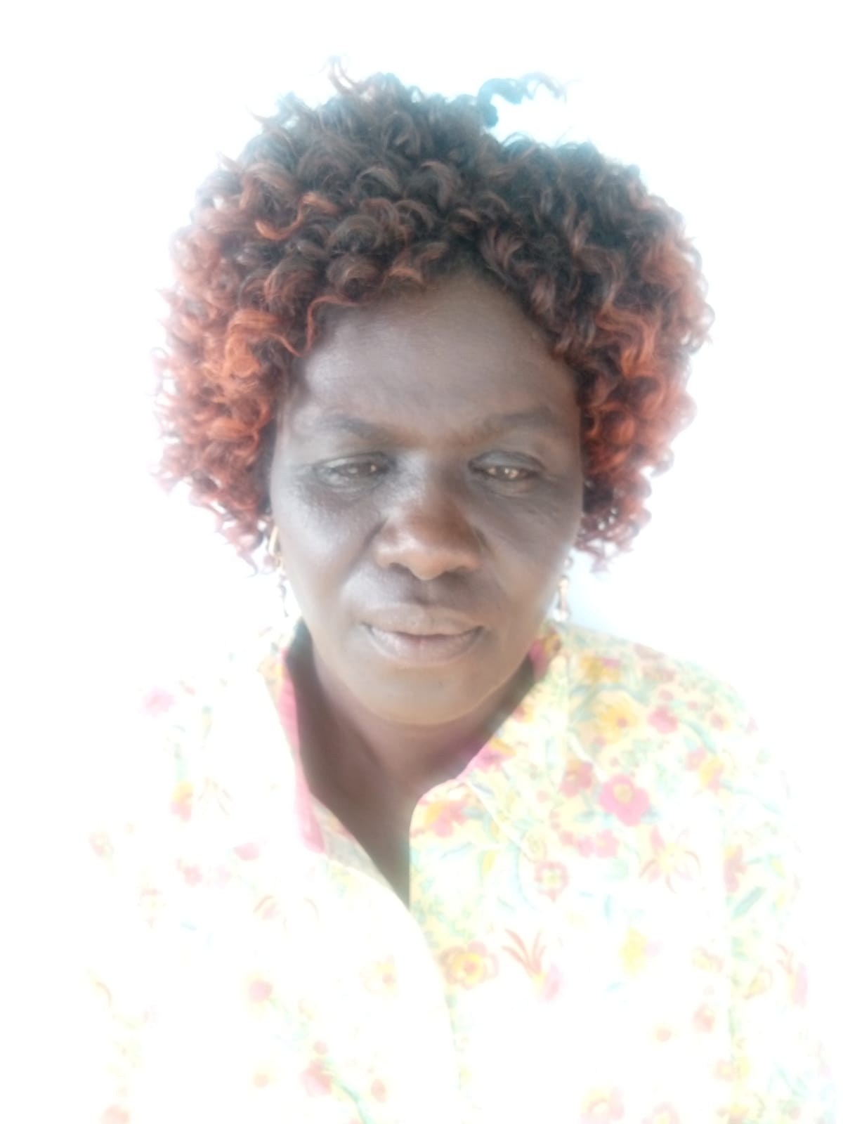 Mrs. ESTHER ELIBIT EWALAN 